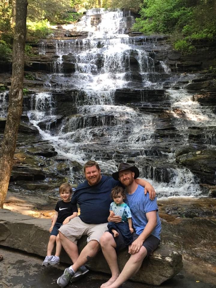 Justin and Ryan with their kids at a North Georgia waterfall